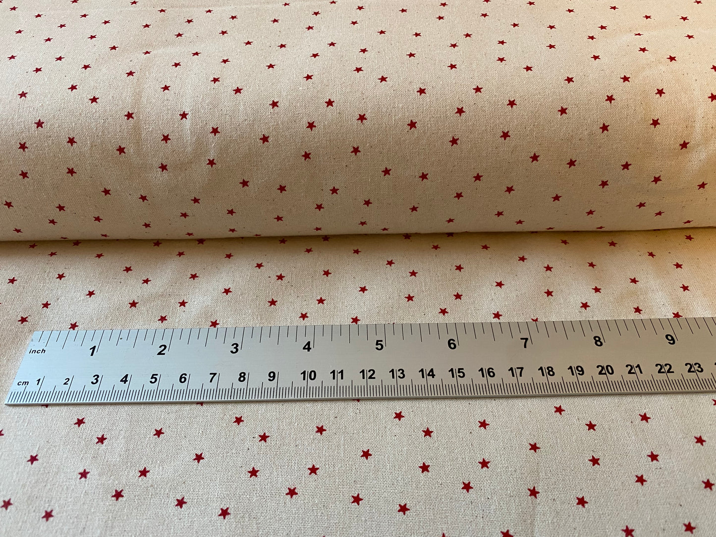 John Louden Christmas 100% Cotton Fabric - Scandi Mini Red Stars on Natural Background